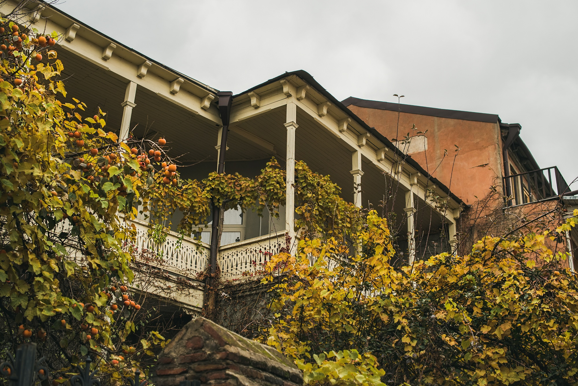 Typical house exterior of Tbilisi old town center in Autumn